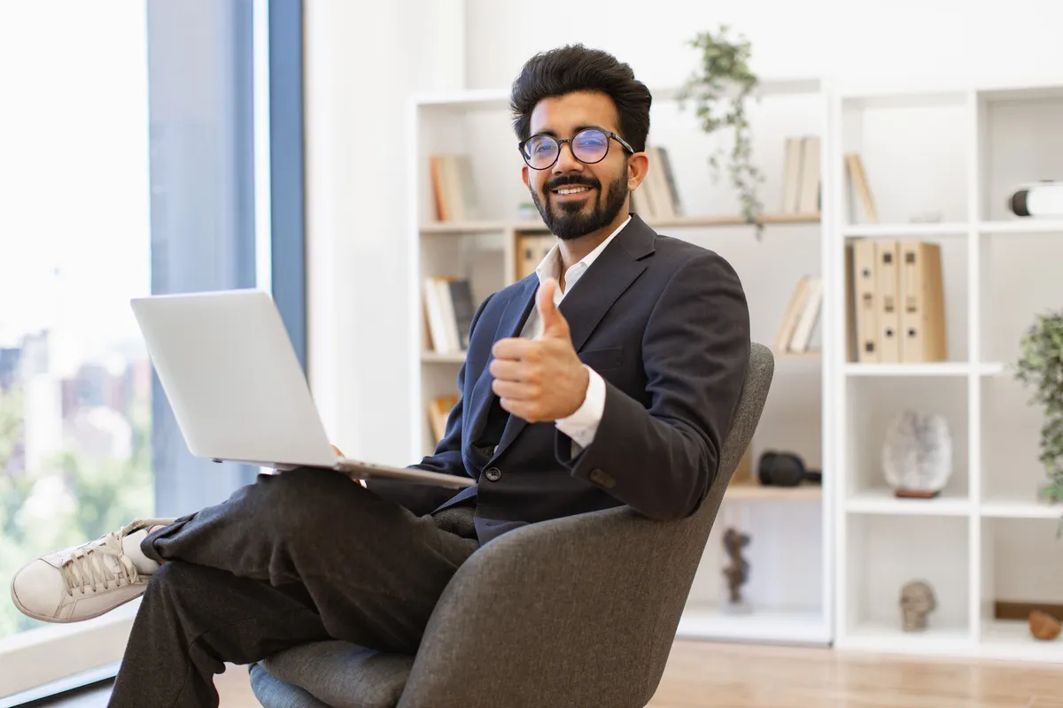 Young Indian professional working in a bright modern office